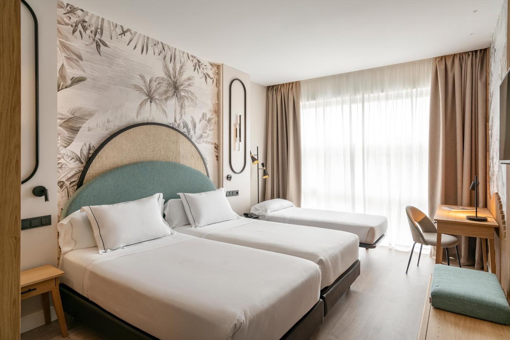 Vincci room vista jardín